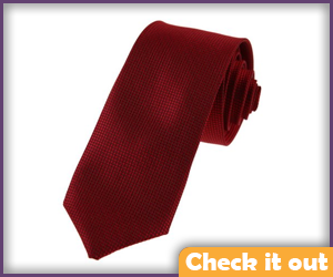 Skinny dark red tie.